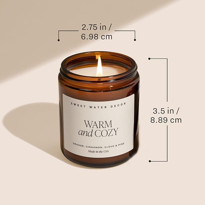 Sweet Water Decor Warm and Cozy Candle | Pine, Orange, Cinnamon, and Fir Balsam Winter Scented Soy Candles for Home | 9oz Amber Jar with Black Lid, 40 Hour Burn Time, Made in the USA