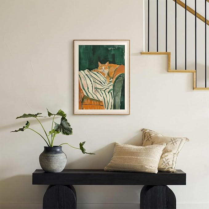 ASTRDECOR Minimalist Framed Wall Art - Cozy Cat Sleeping on Couch with Vintage Green & White Striped Blanket, Trendy Cute Orange Cat Canvas Posters, Modern Aesthetic Bedroom Apartment or Living Room Décor 12x16Inch