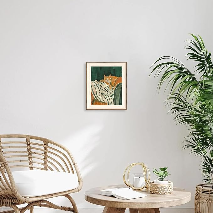 ASTRDECOR Minimalist Framed Wall Art - Cozy Cat Sleeping on Couch with Vintage Green & White Striped Blanket, Trendy Cute Orange Cat Canvas Posters, Modern Aesthetic Bedroom Apartment or Living Room Décor 10x12Inch
