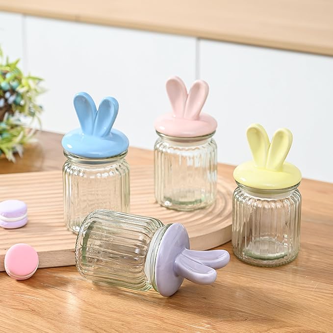 FESTGLOX Glass Easter Candy Jars with Ceramic Bunny Ear Lids, 4Pcs Sealing Bunny Jars in Pastel Colors for Storage, Mini Eggs, Cookies, Tray, Table Centerpiece, Kitchen, Home Spring Decor